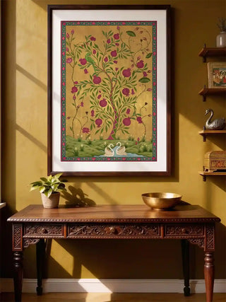 Framed Royal Bagh wall art in marigold gold above a carved rosewood console with a brass bowl and potted plant in a sunlit entryway.