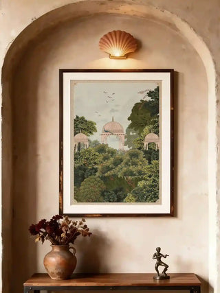 Royal Enclave wall art with peacock and domed pavilions displayed in an arched wall niche above a rustic console table