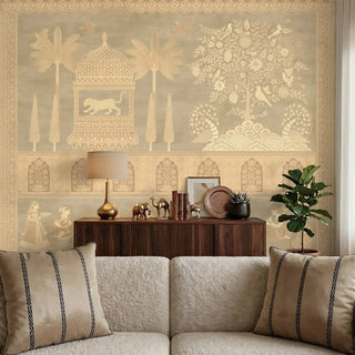 A luxury living room featuring the Royal Heritage Indian mural in golden sage behind a wooden sideboard and cream sofa.