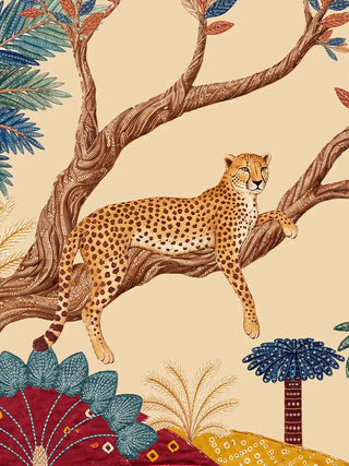 Close-up detail of The Royal Jungle Safari wall art showing a cheetah reclining on a twisted tree branch with multi-coloured leaves in blue, rust, teal and green against a warm parchment ground