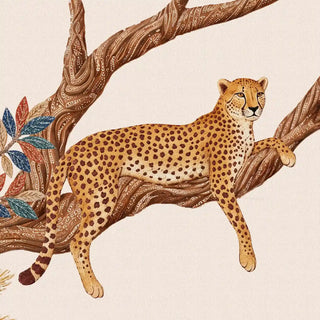 A close-up of the Royal Jungle Safari wallpaper showing a spotted big cat resting on a carved-looking branch beside blue, rust and teal stitched leaves, on a cream ground.