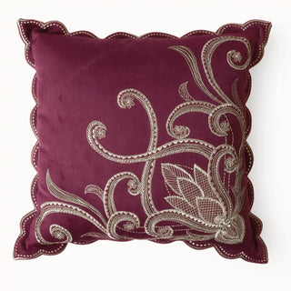 Full studio view of the Royal Vine Cushion Cover with gold embroidered vine on maroon velvet.