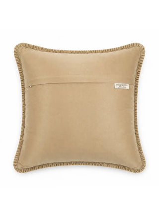 The smooth back side of the Rukhsar gold cushion cover displaying the hidden zipper enclosure and product brand tag.