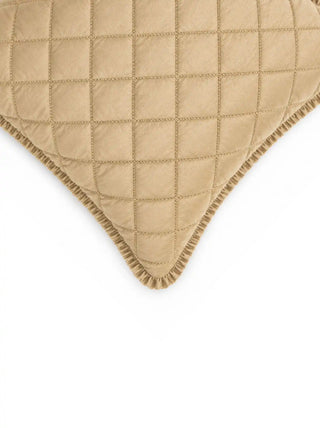 A detailed macro view of the Rukhsar silk throw pillow cover showing the diamond-quilted grid patterns and stitched margins.