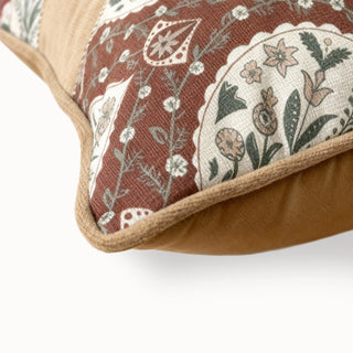 Close-up of the Rustic Frame Cushion corner showing the floral print edge and piping.