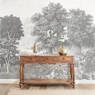 A full-scale Saanjh charcoal wall mural featuring a hand-sketched forest landscape with wildlife and ornate arches.