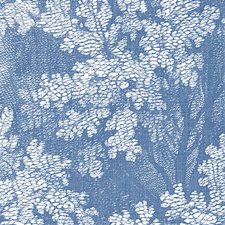 White floral wallpaper pattern on a blue background