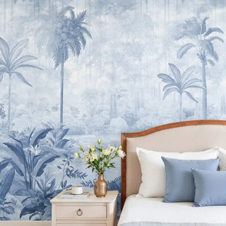 Bedroom with palm tree wallpaper and a vase of flowers on a nightstand.