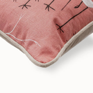 Close-up of the Sedge Cushion corner showing the pink fabric and grey piping.
