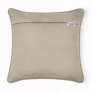Back view of the cushion cover showing the solid beige velvet backing and zipper.
