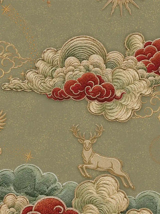 Close-up detail of an embroidered stag beneath layered sage and vermilion clouds, capturing the dimensional stitchwork of the Seraphim wall art