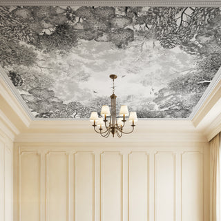 Shadow Nest grayscale forest canopy mural applied to a recessed ceiling in a luxury dining room with a classic chandelier.