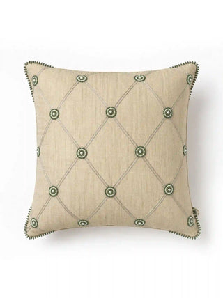 A full front view flat lay of the square Shahzar cushion cover showcasing its symmetrical silver diamond trellis and pearl-centered bead rosettes