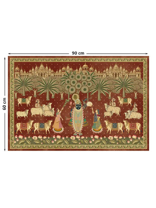 The Shrinathji Madhuban wall art in Maroon & Gold, medium size 60 by 90 centimetres, showing Shrinathji flanked by gopis amid decorated cows, palm trees and a temple city skyline, bordered by a lotus pond.