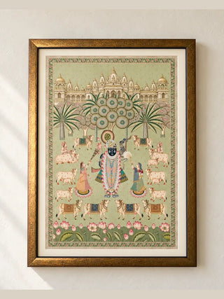 Shrinathji Madhuban Pista framed wall art: Pichwai-inspired scene with cows and lotuses on pista green, wooden frame with ivory mount