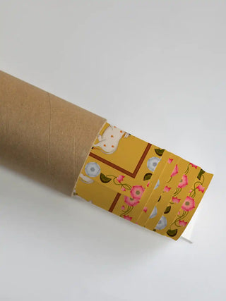 Rolled Shrinathji Pichwai wall art poster inside eco-friendly shipping tube.