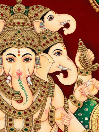 A detailed close-up of the Shriyam wall art highlighting the five-headed Ganesha figure rendered in gem-set gold relief work.