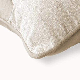 A macro close-up highlighting the contrast between the smooth taupe velvet and the textured ivory chenille weave.