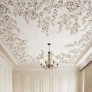 A luxury grand room featuring the Silent Orchard light sepia ceiling mural styled with a classic tiered chandelier and white wainscoting.