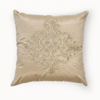 A top-down view of the Silken Ornate cushion cover showcasing the full central embroidered medallion on a champagne gold base.