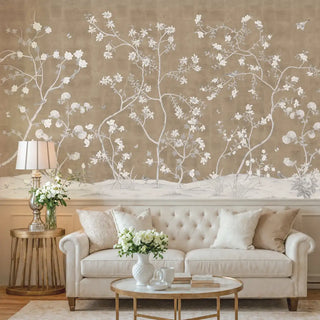 Wide view of Sitara wallpaper with winding white floral branches in a luxury living room setting.