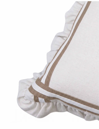 Close-up corner detail of Spellbound Ruffle cushion cover showing the mocha herringbone grosgrain tape border, crisp white ribbon inner trim, and the gathered ivory ruffle edge meeting at a mitered corner