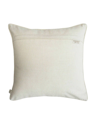 The reverse side view of the Stardust cushion cover showing the clean fabric backing, hidden zipper closure, and woven brand tag.