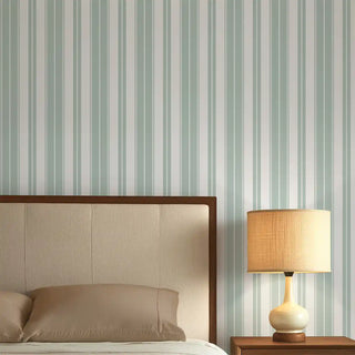 Bedroom wall styled with Subtle Mint Green & White Stripe Wallpaper Roll, featuring fresh mint green and crisp white stripes behind a neutral headboard and soft lighting.