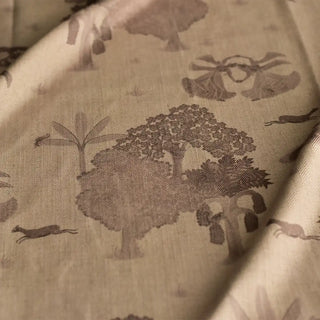 A draped view of the Taal Sepia fabric showing the soft textile weave and the detailed vintage-style botanical print.