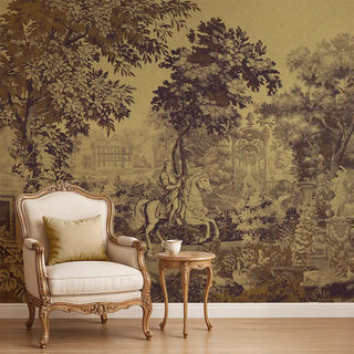 A mustard and purple-toned European tapestry wallpaper featuring scenic landscapes, lush trees, and a horse rider, styled behind a classic vintage armchair.
