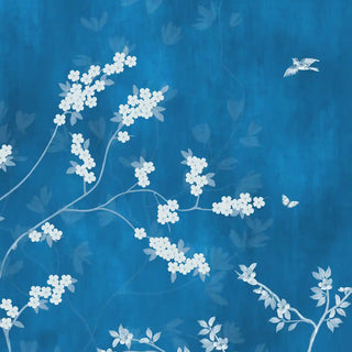 The Blue Pavilion Wallpaper: Close-up detail of the delicate white blooming branches against the rich blue background.