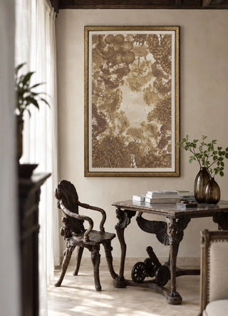 The Forest Nest embroidered wall art framed above a carved wooden table and armchair beside a curtained window.