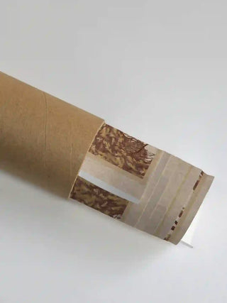 The Forest Nest wall art shown rolled in protective shipping tube packaging