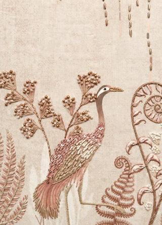 A detailed macro close-up of The Secret Garden embroidered wall art highlighting the sequin-worked wading bird, beaded ferns and coiled fiddlehead embroidery.