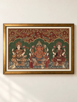 Trideva Mangalam framed wall art: Saraswati, Ganesha and Lakshmi in ruby red and emerald green, landscape wooden frame with ivory mount