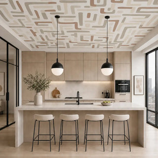 The Urban Maze neutral abstract geometric labyrinth ceiling wallpaper mural styled inside a luxury modern organic kitchen over a white marble island view-ceiling