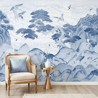 Vana Geet Wallpaper: Full mural installation of the blue mountain and pine tree landscape with cranes in a sitting area.