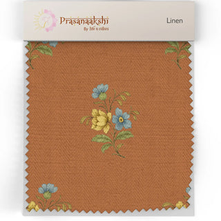Fabric swatch of Vasant Upholstery Fabric featuring terracotta base with yellow and blue floral embroidery.