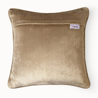 Back view of the cushion cover showing the solid beige velvet and concealed zipper.