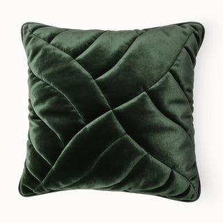 A full-front view of the Velvet Dune forest green cushion featuring a sophisticated diamond quilted pattern.