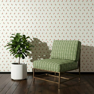 Chair upholstered in Vineyard Green Fabric, styled against a floral wallpaper background, adding freshness to a modern space.