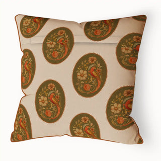 A side view of the "Vintage Blossom Pipin" cushion cover, showing its full shape and the beautiful, detailed vintage pattern from a different angle.