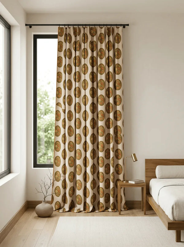 Patterned Vintage Blossom curtain in a bedroom with a bed and side table.