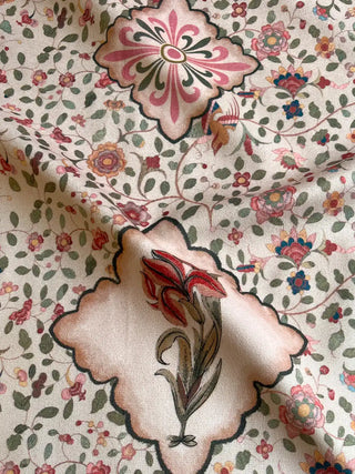 A draped view of the Viraasat Sepia textile showing the soft weave and rhythmic quatrefoil floral pattern.