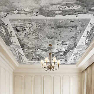 A luxury grand living room featuring the Voyage of the Clouds charcoal ceiling mural styled with a classic chandelier and white wall panels.