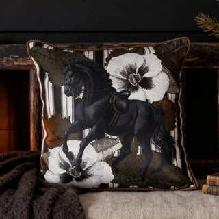 The Wild Blooms cushion styled in a moody, rustic setting with dark wood accents