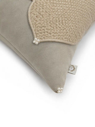A high-resolution close-up of the natural jute basket-weave panel, gray suede face, and white seed pearl cluster accents on the Zayan Weave cushion cover.