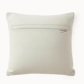 Back View Mono swirl Cushion Cover Featuring raised tufted black patterns 